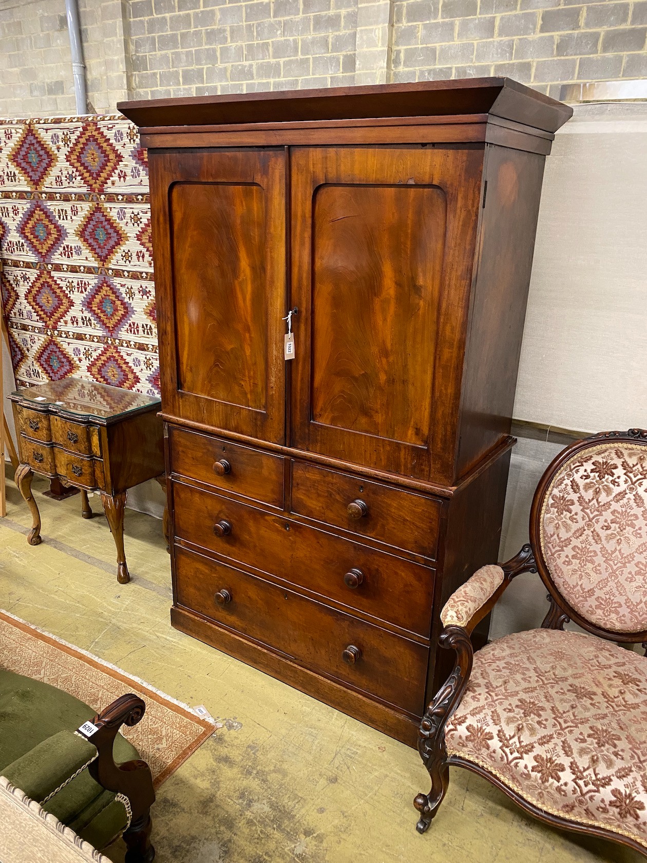 A small Victorian mahogany linen press, width 113cm, depth 54cm, height 179cm